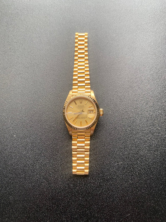 Ladies "President" 18 Kt Gold Rolex Presidential watch 26 mm model #69178, with gold-tone dial, circa 1984