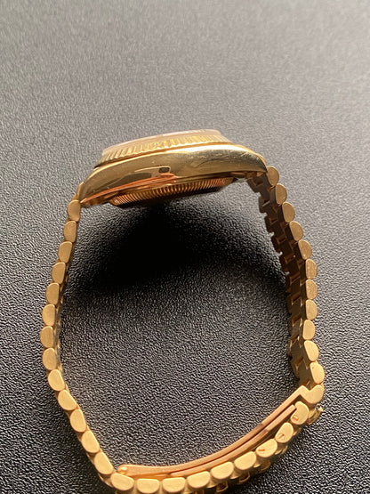 Ladies "President" 18 Kt Gold Rolex Presidential watch 26 mm model #69178, with gold-tone dial, circa 1984